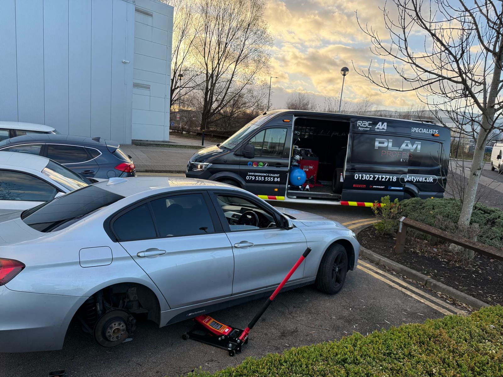 Mobile tyre fitting on a BMW at an industrial estate